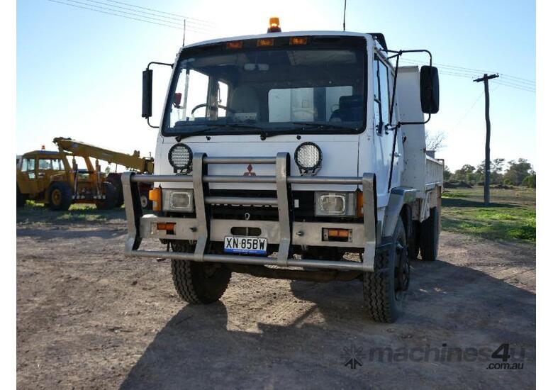 caption MITSUBISHI TIPPER TRUCK