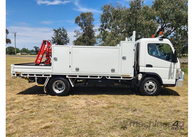 Mitsubishi Fuso Canter 815 4x2 Traytop Service Body with Crane Truck.