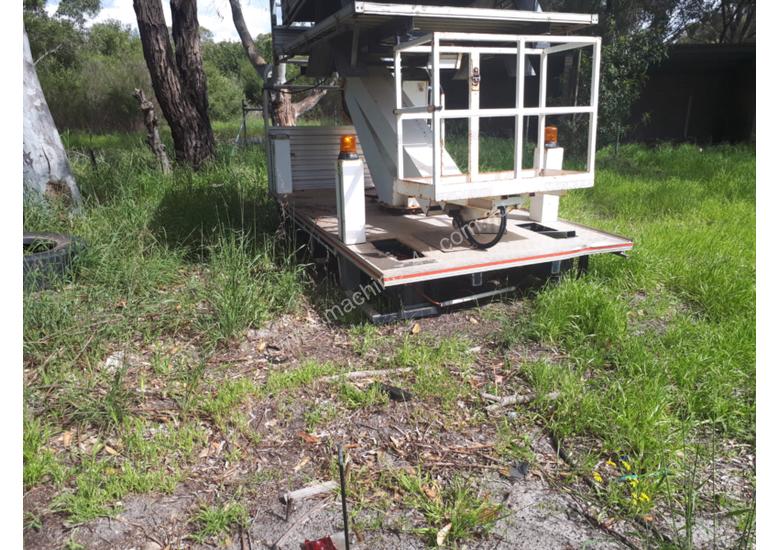 caption UTILITY MOUNTED CHERRY PICKER