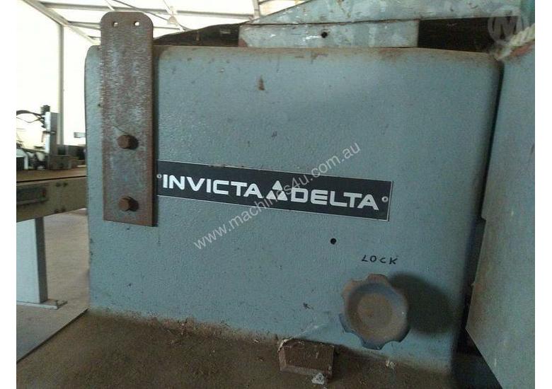 caption Invicta Delta Spindle Machine