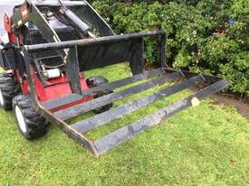2017 Toro 320D Mini Loader/Digger with attachments and trailer - picture1' - Click to enlarge