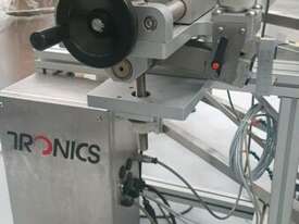 Labelling machine/Labeller (Tronics) and conveyor system - picture2' - Click to enlarge