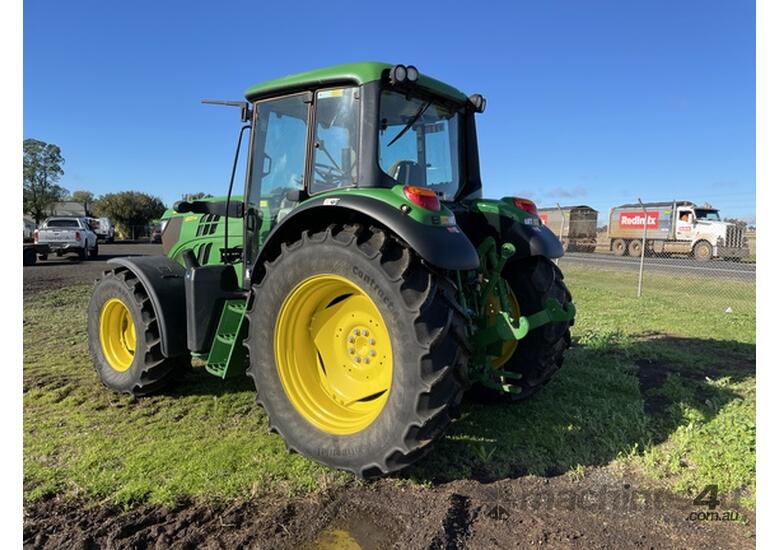 caption 2014 John Deere 6125M Utility Tractors