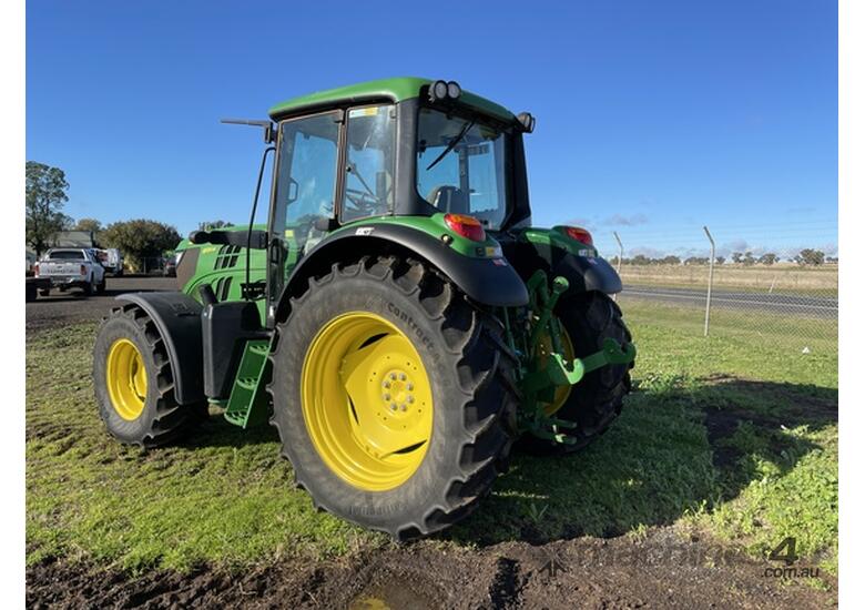 caption 2014 John Deere 6125M Utility Tractors