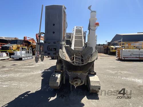 caption Wirtgen Slipform Paver