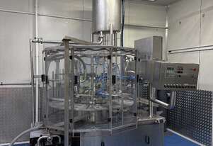 Twin liquid rotary filler
