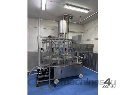 Twin liquid rotary filler 