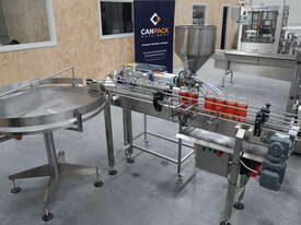 Semi-Automatic Bottle Filling Line - picture0' - Click to enlarge