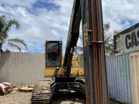 Tigercat 250D excavator with 3 finger metal grab - picture0' - Click to enlarge