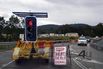 Solar Powered Portable Traffic Lights with Intelligent Charging