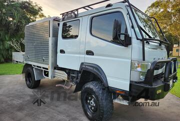 2019 Mitsubishi Fuso Canter 4x4 truck 3.0L diesel 7 seater - perfect for work or play.
