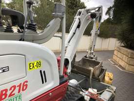 Takeuchi Mini Excavator with tandem trailer  - picture0' - Click to enlarge