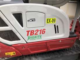 Takeuchi Mini Excavator with tandem trailer  - picture1' - Click to enlarge