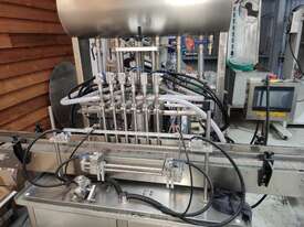 Bottles filling machine - picture0' - Click to enlarge