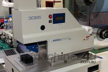 AccuPlace Model 3065 is a film adhesive and label applicator