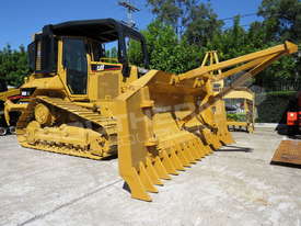 Caterpillar D5N XL Bulldozer with Stick Rake & Spear DOZCATM - picture0' - Click to enlarge