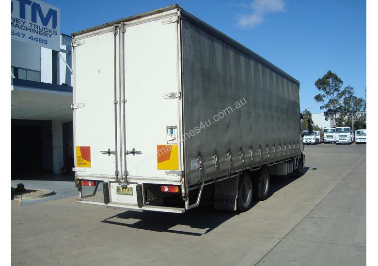 caption Iveco Eurocargo ML225 Curtainsider Truck