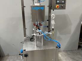 LCM-4 Series Semi Automatic Cap Tightening Machine - picture0' - Click to enlarge