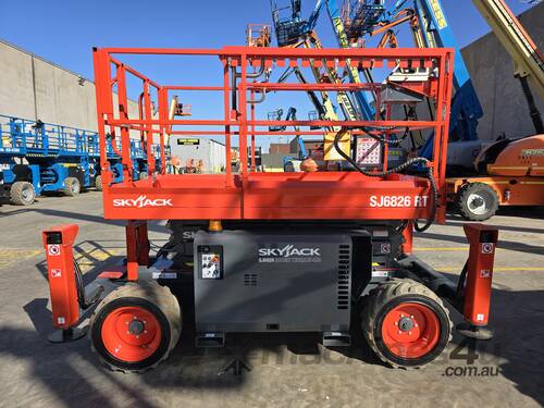 caption Skyjack SJ6826RT Rough Terrain Scissor Lift