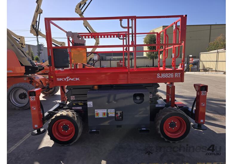 caption Skyjack SJ6826RT Rough Terrain Scissor Lift