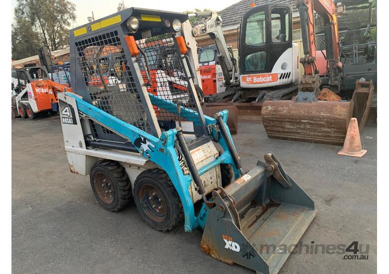 caption Toyota 4SDK4 Skid Steer – Compact Loader for Excavation & Handling!