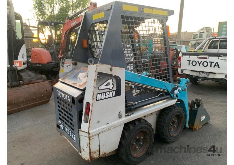 caption Toyota 4SDK4 Skid Steer – Compact Loader for Excavation & Handling!