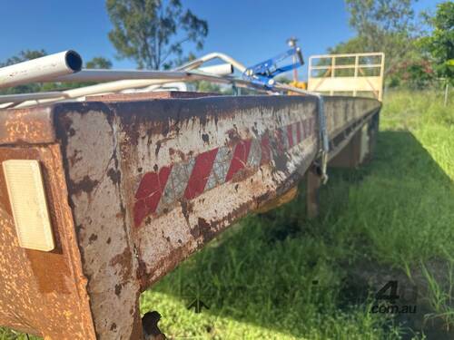 caption 1982 Fruehauf PH122F3W Tri Axle Flat Top Trailer
