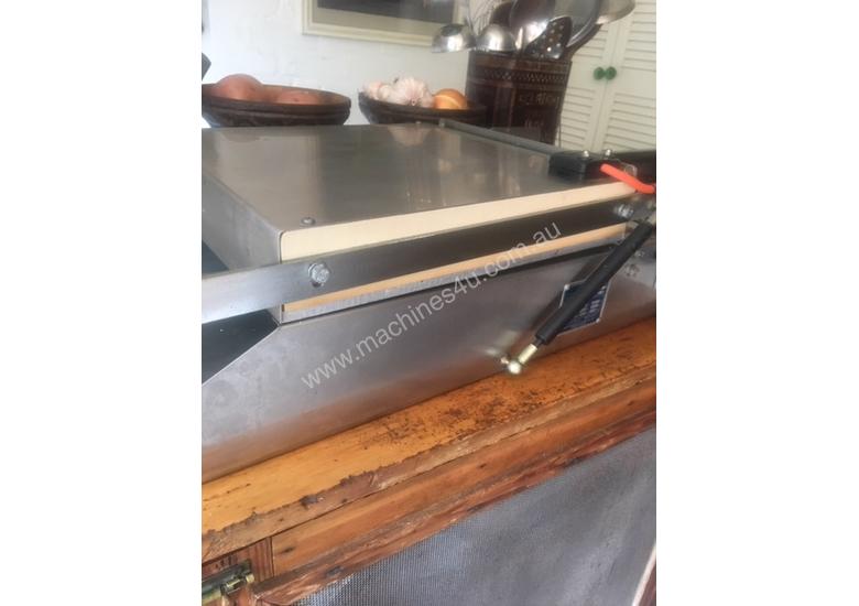 caption HELIX Tray Sealer