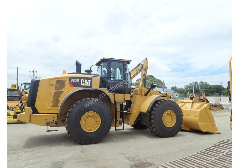 caption 2018 Caterpillar 980M Wheel Loader