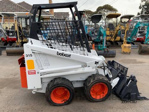 Bobcat 315, with 4 in 1 bucket