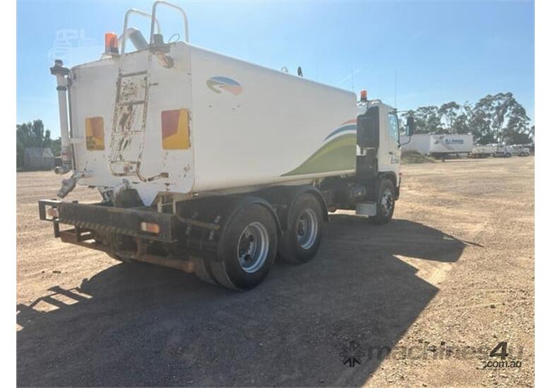 caption 2003 Hino FM1J Water Truck – Used, Manual, Rear Sprays & Dribble Bar!