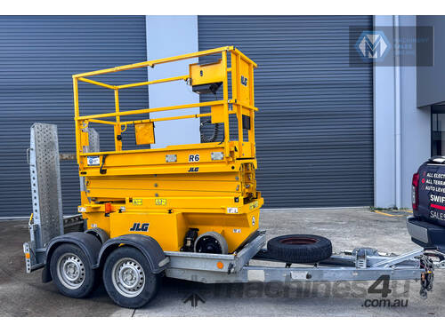 caption JLG 19ft Scissor Lift and Trailer