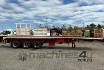 1986 Krueger Tri Axle Extendable Flat Top Trailer