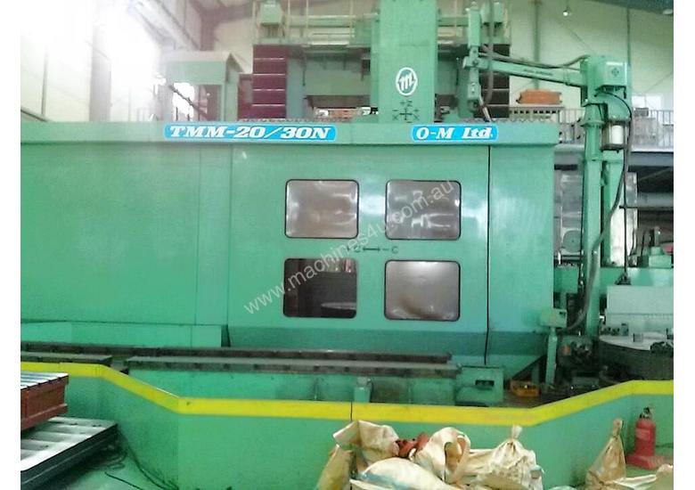caption 2001 OM Japan TMM-20/30N CNC Vertical Turn Mill