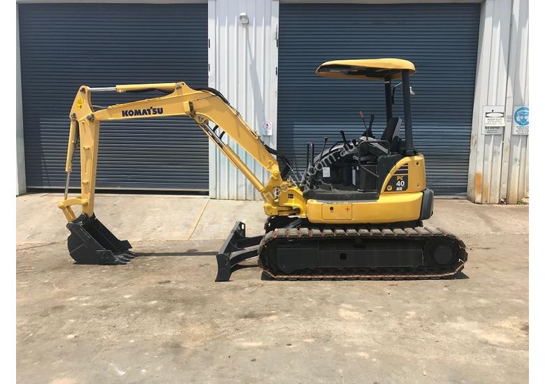 caption USED 2011 KOMATSU PC40MR MINI EXCAVATOR