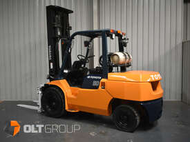Toyota 7FG50A 5 Tonne Forklift with Wide Fork Positioner Attachment LPG 3624 Hours Only - picture0' - Click to enlarge