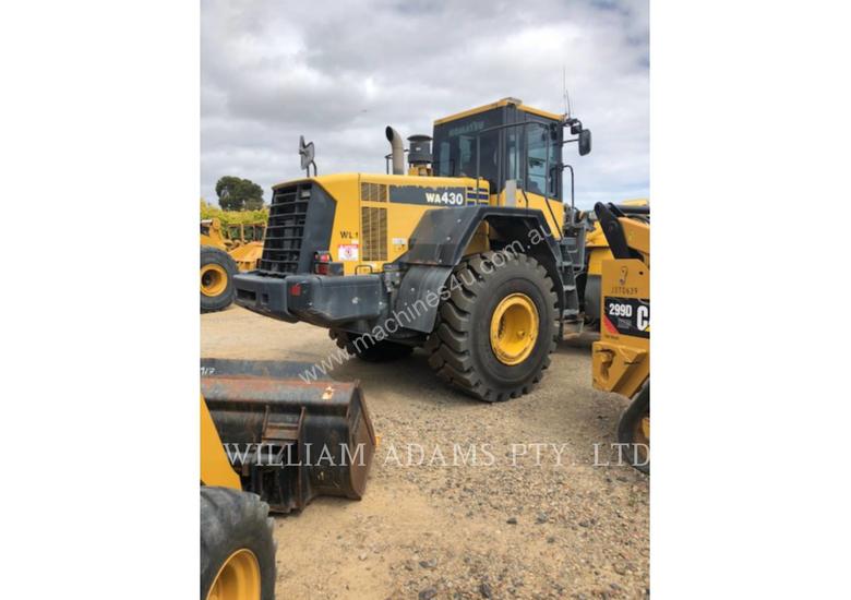 caption KOMATSU LTD. WA430-6 Wheel Loaders integrated Toolcarriers