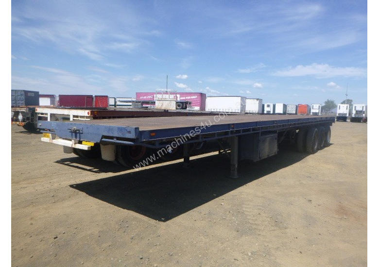 caption Fruehauf Semi Flat top Trailer