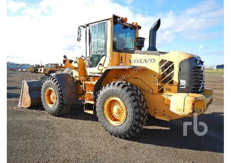 caption VOLVO L70F Integrated Tool Carrier