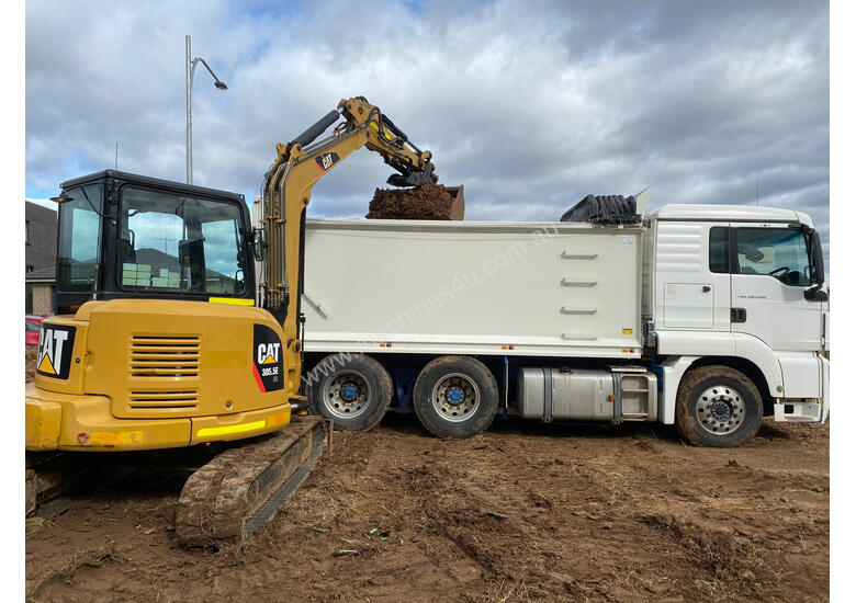 caption Tipper Truck Bogie with Large 18m3 Bin for Soil Clay Rock Concrete Removal