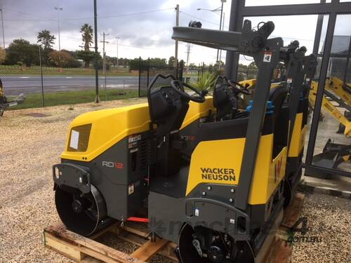 caption WACKER NEUSON RD12-90 TWIN DRUM ROLLER