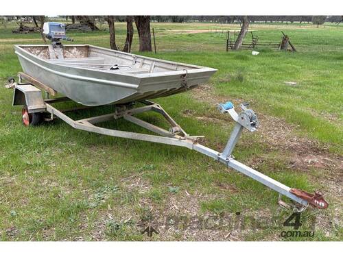 FLAT BOTTOM BOAT ON TRAILER