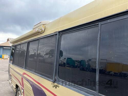 caption Toyota Coaster Camper Bus