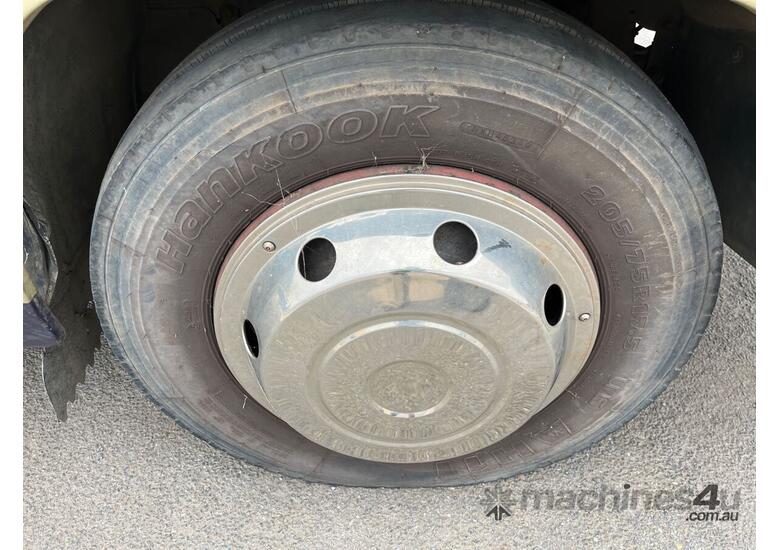 caption Toyota Coaster Camper Bus