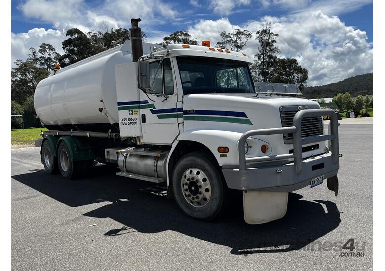 caption 1998 Freightliner FL112 Water Cart