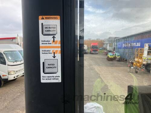 caption 2010 Crown RR5725-35 Electric Reach Forklift (Stand on)