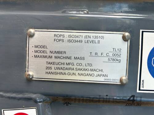 caption 2015 Takeuchi TL12 Skid Steer (Rubber Tracked)