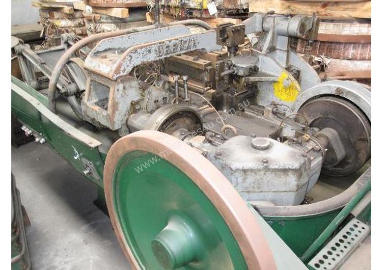 caption Heenan Multi-Form Machine