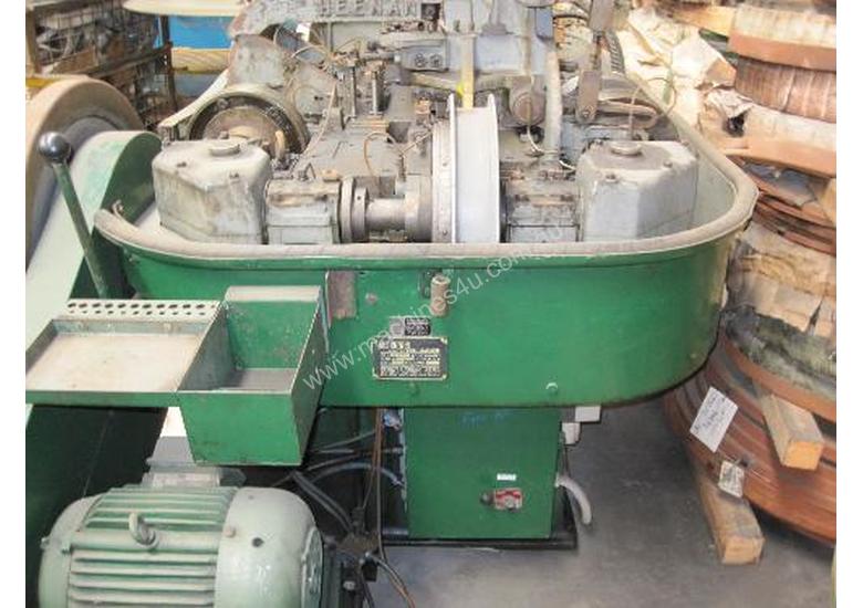 caption Heenan Multi-Form Machine
