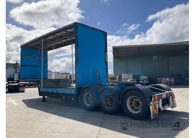 caption 2008 Maxitrans ST3 Tri Axle Drop Deck Curtainside A Trailer